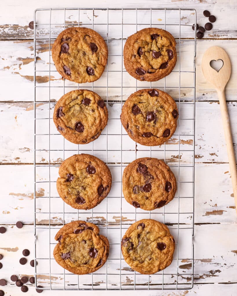 Brown butter chocolate chip cookies cooling on a wire rack. 
