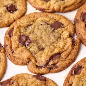 Close up of brown butter chocolate chip cookies, the chocolate is still melty and shiny.