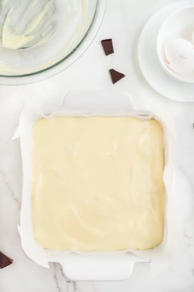 Cheesecake layer on top of brownie batter to make cheesecake brownies.