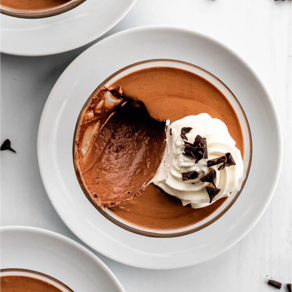 Baileys flavored chocolate mousse from above with a spoonful taken out of it.