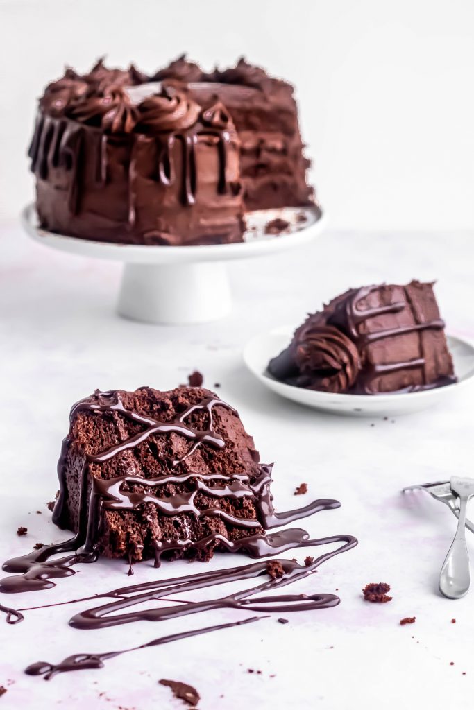 death by chocolate cake with melted chocolate ganache drizzled on top