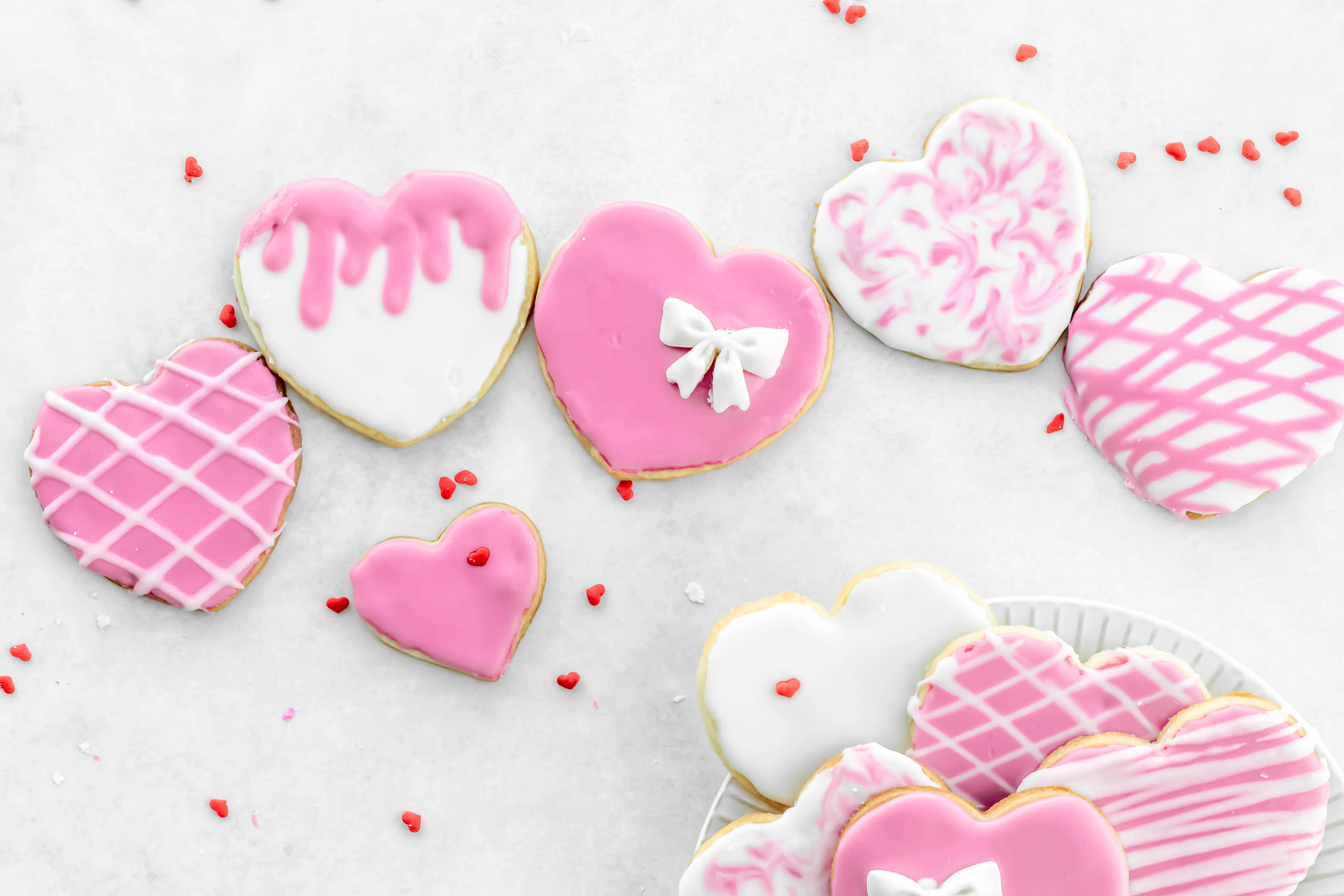 Sugar cookies for valentines day, heart shaped and iced in pink and white