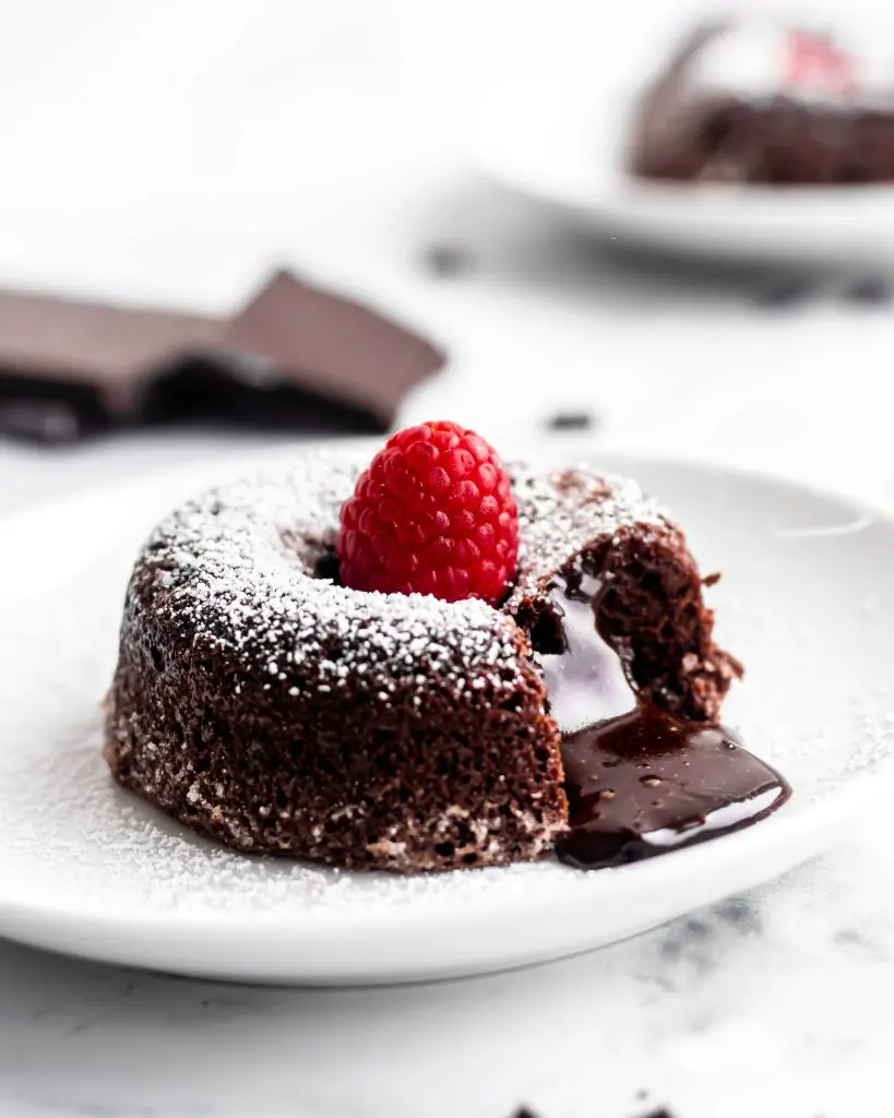 Molten chocolate lava cake with melty middle pouring out - food photographer vancouver