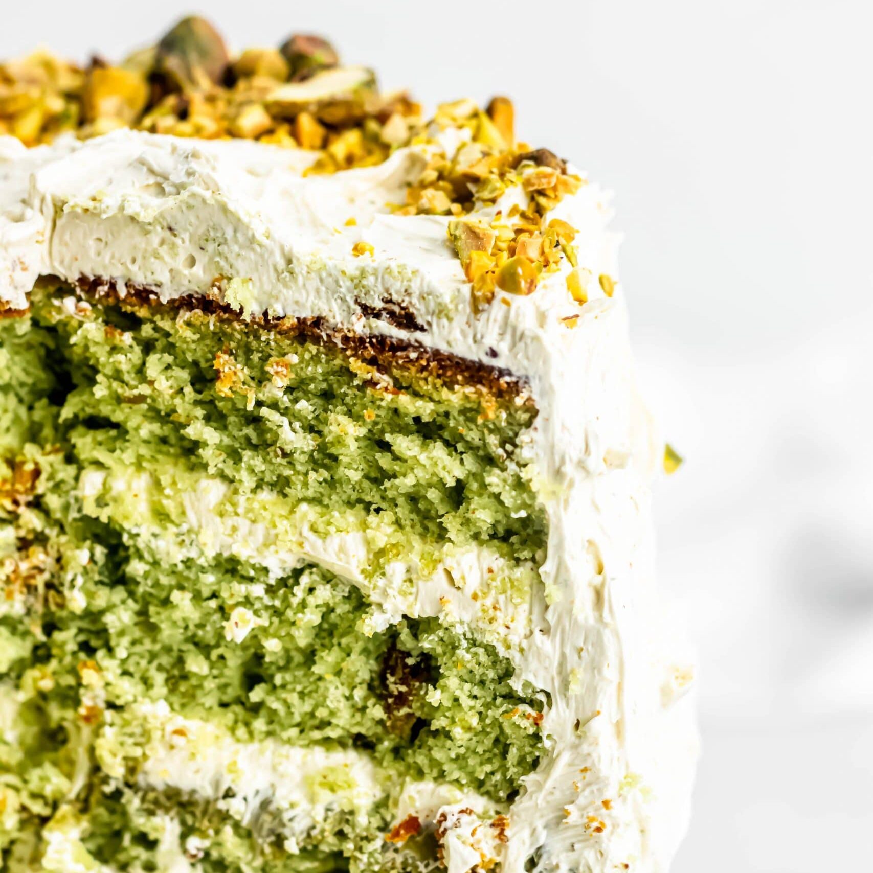 close up of pistachio cake, bright green sponge flavoured with real pistachios