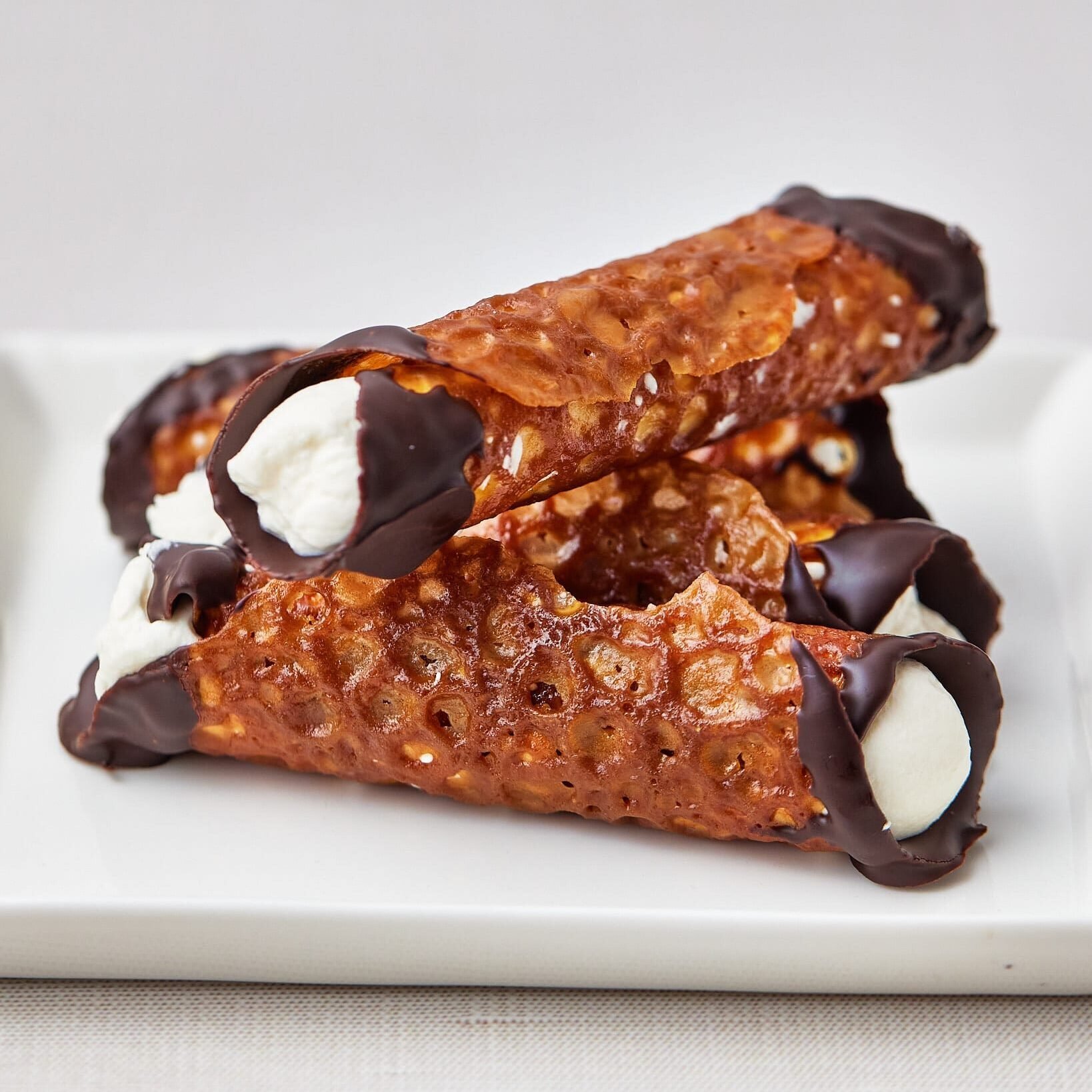 brandy snaps with amaretto cream