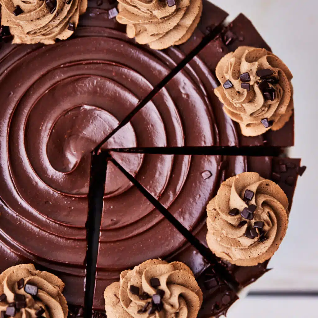 Chocolate cheesecake from above showing a swirl of chocolate ganache.