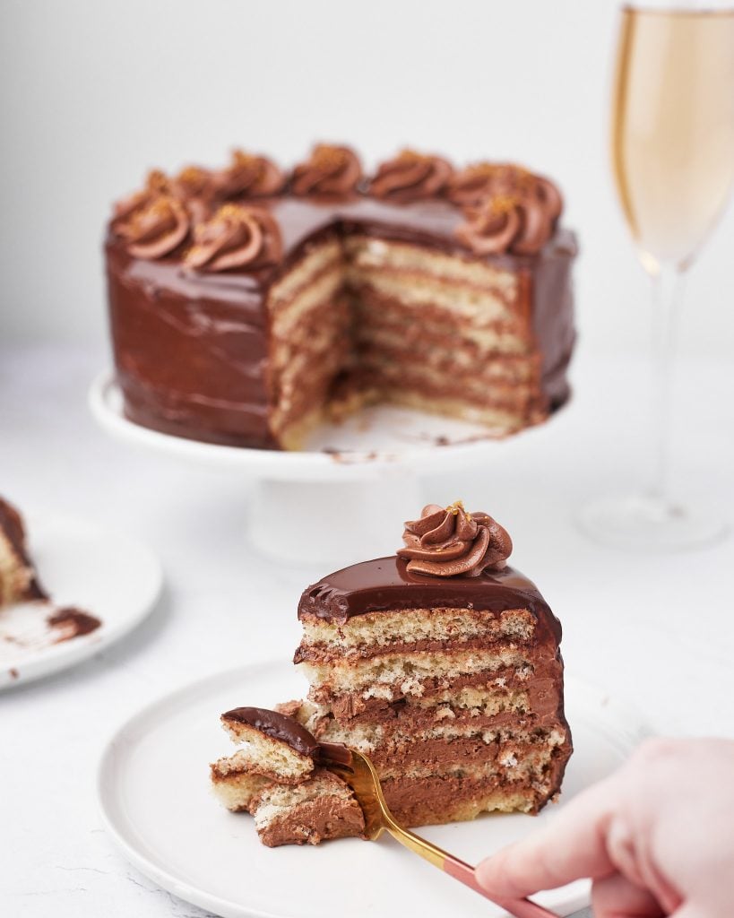 taking a bite of german layer cake