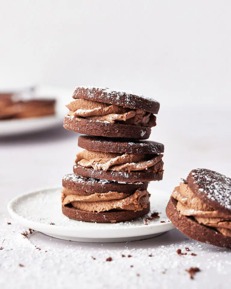 chocolate sandwich cookies stacked on top of each other