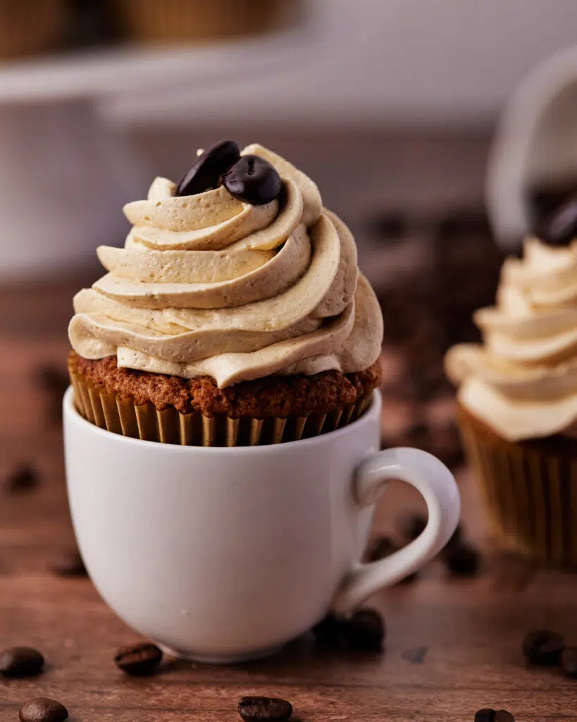 coffee cupcake inside an espresso cup. 