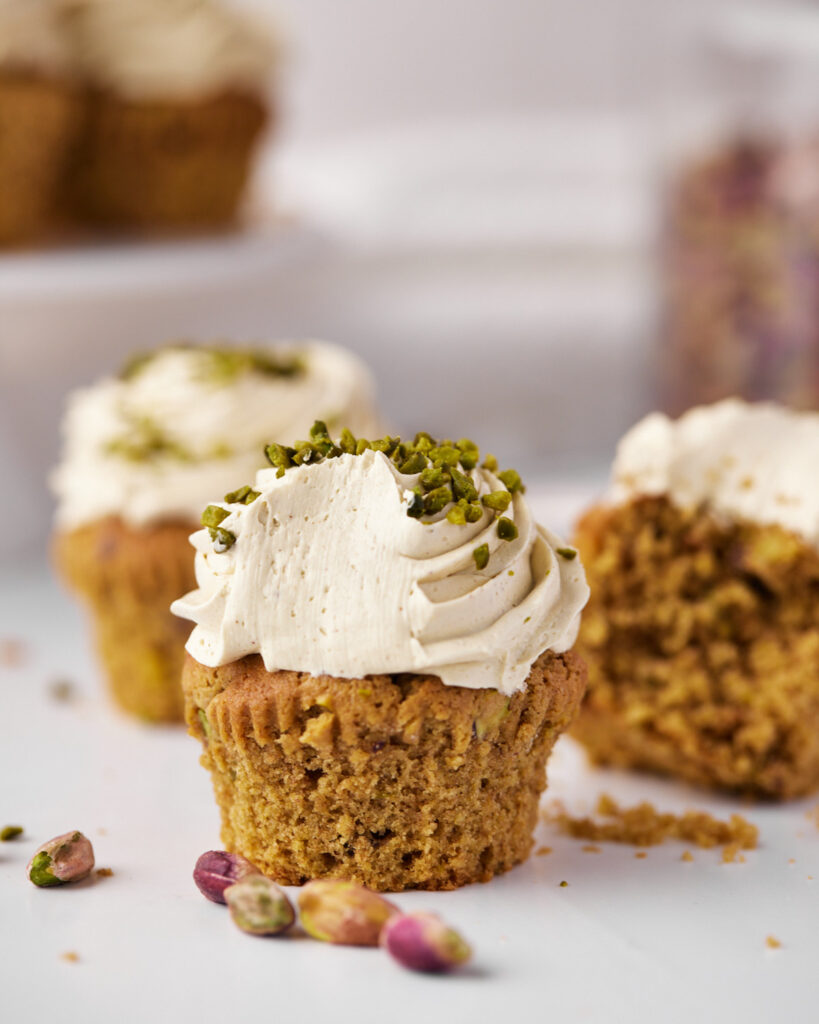 pistachio cupcakes with a bite taken out of them