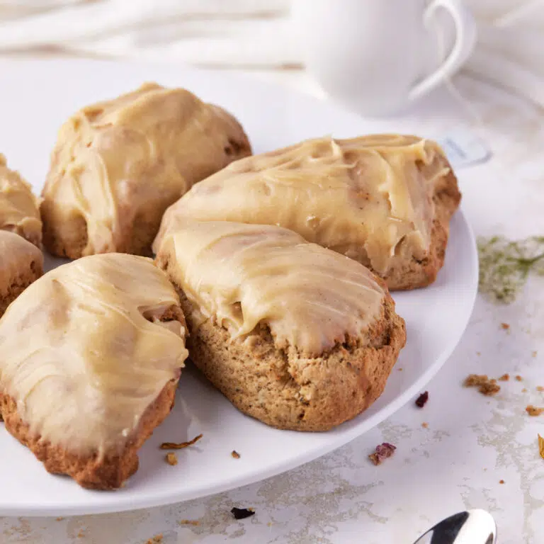 earl grey scones with earl grey glaze on a plate