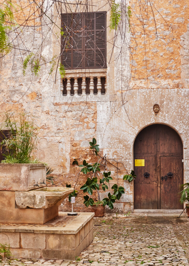beautiful old building in Santanyi with large wooden spanish door. 