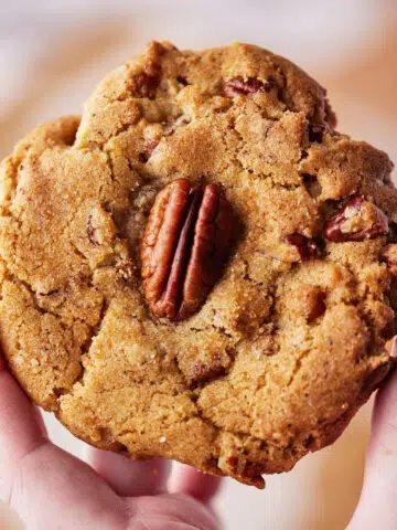 Close up of a brown butter pecan cookie.