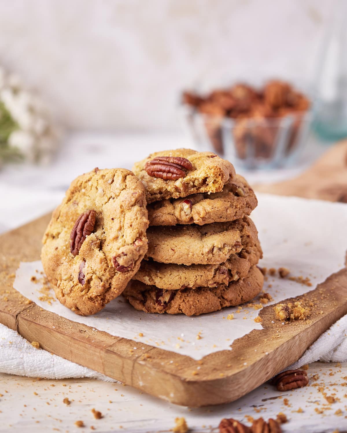 tall stack of brown butter pecan cookies.
