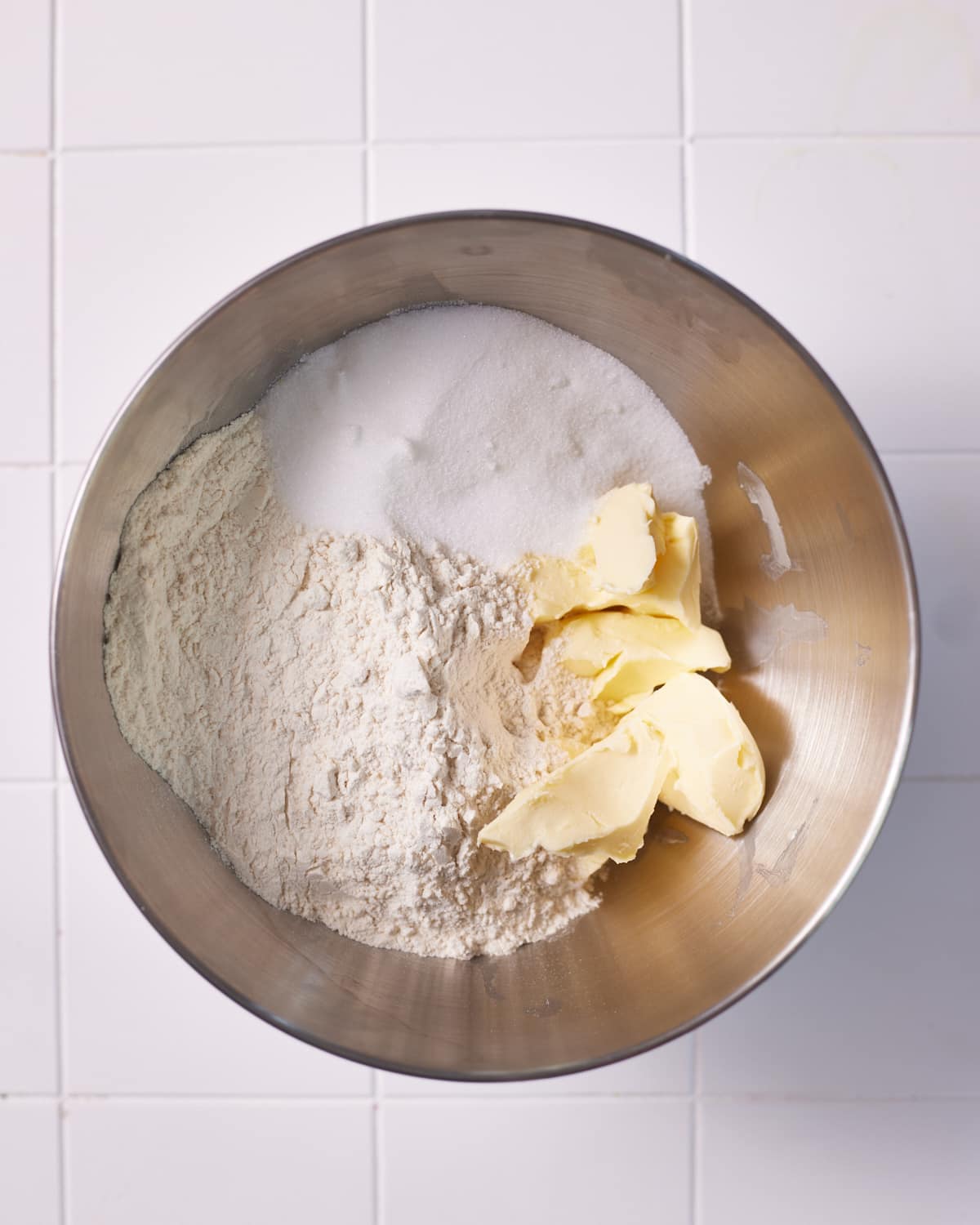 Process shot of making millionaires cheesecake shortbread base. 