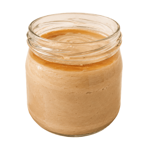 Maple cream in a glass jar that has separated.