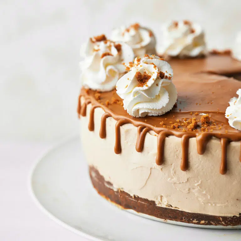biscoff cheesecake with a cookie butter drip.