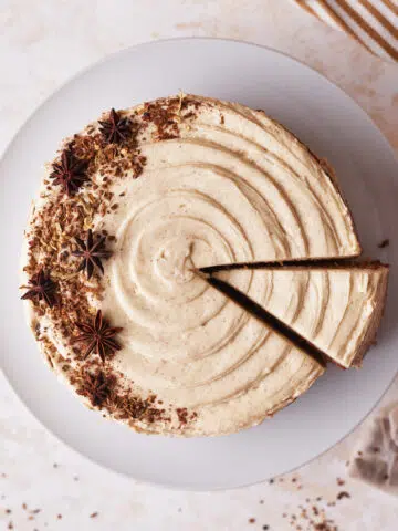 chai cake from above with a slice being taken out.