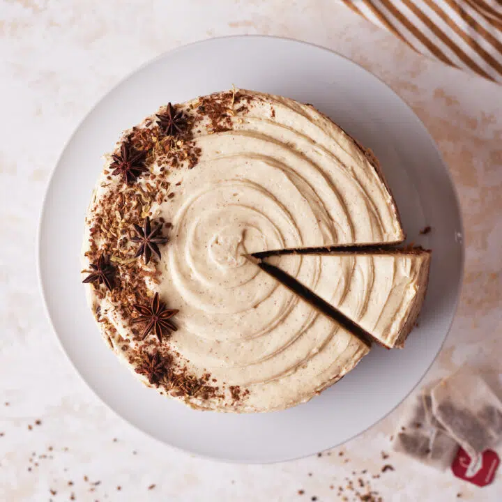 chai cake from above with a slice being taken out.