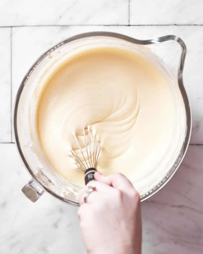 whisking cheesecake mixture for san sebastian cheesecake.