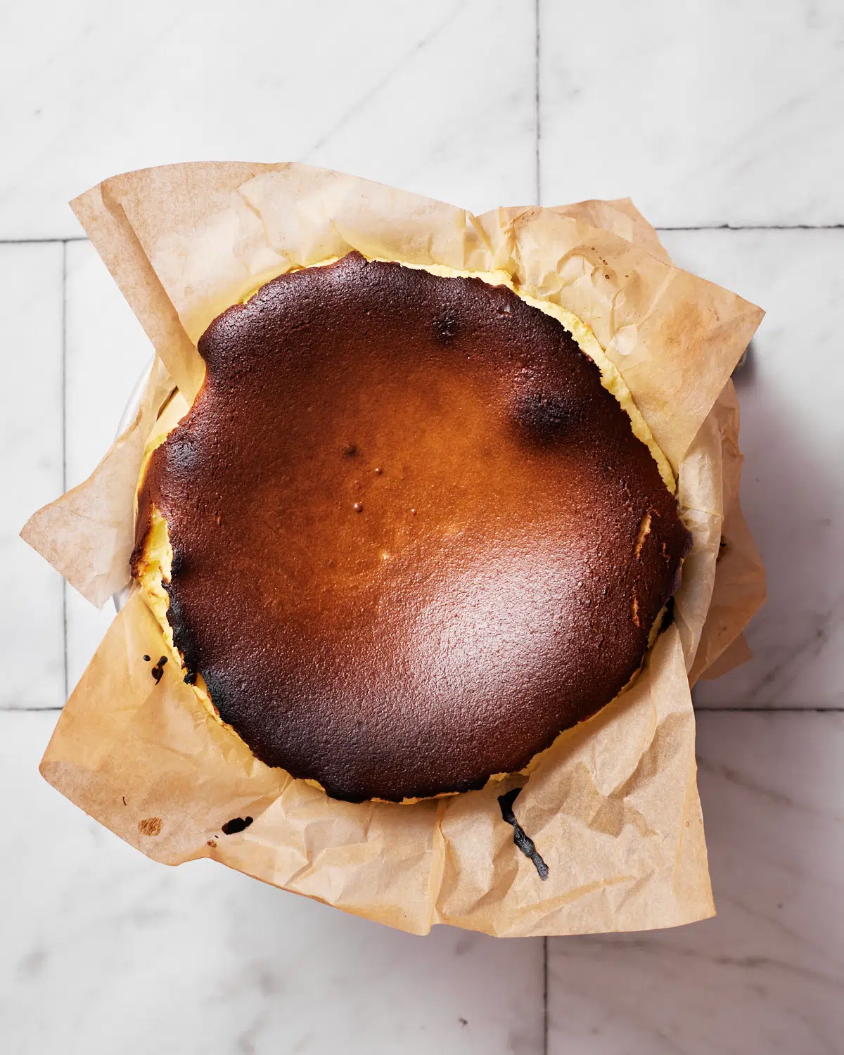 Caramelized top of a burnt basque cheesecake.