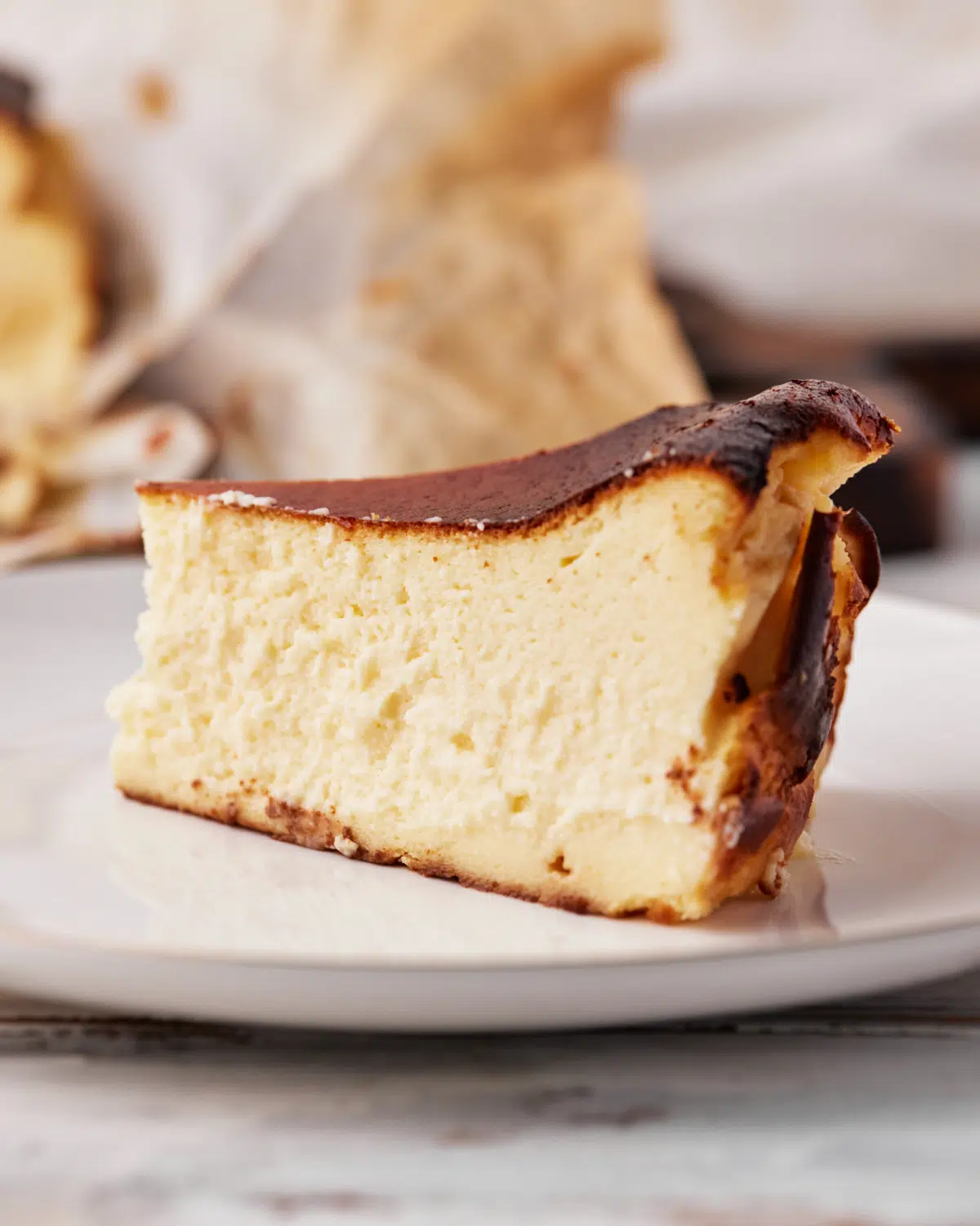 single slice of san sebastian cheesecake.