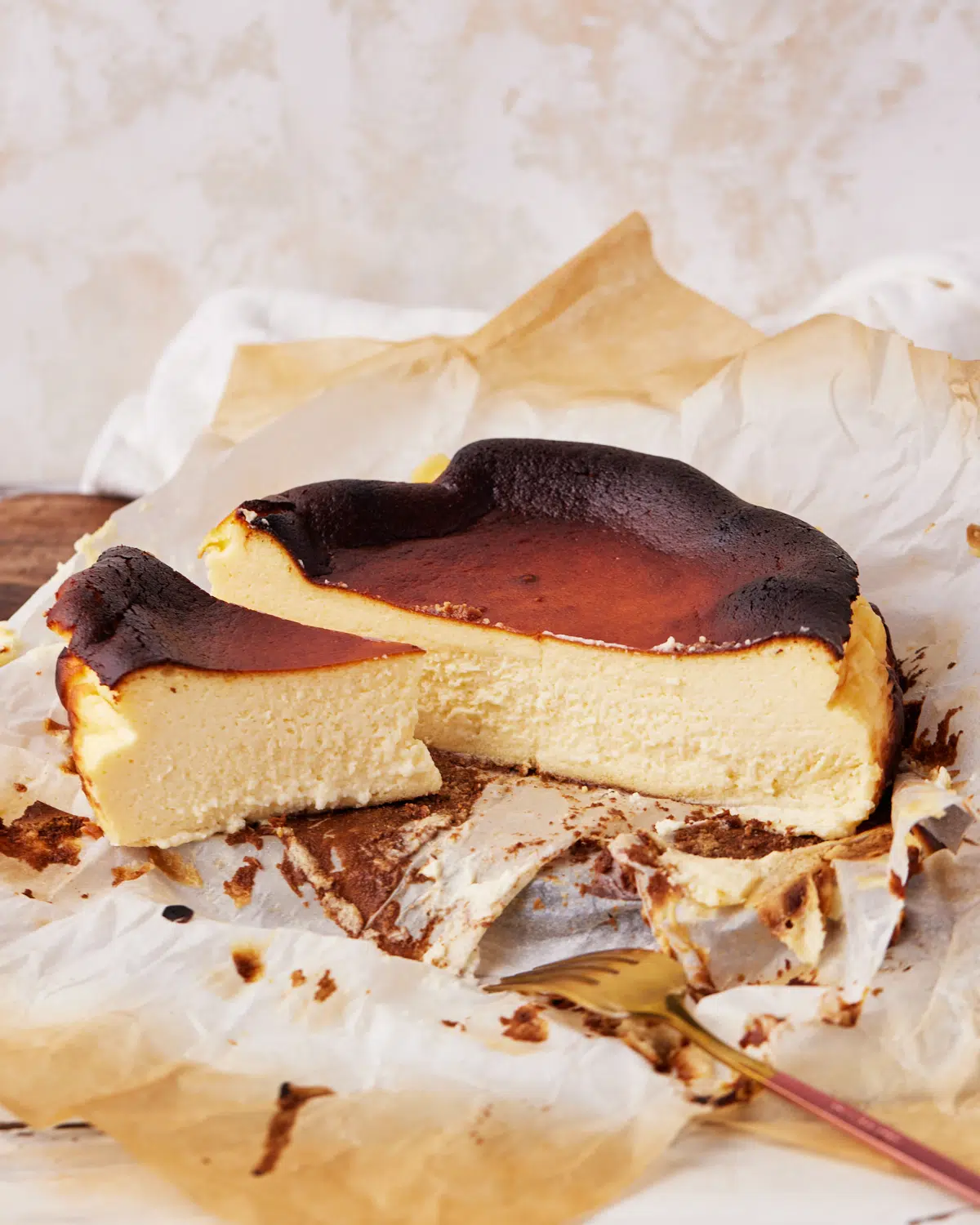 san sebastian cheesecake cut in half to show creamy center.