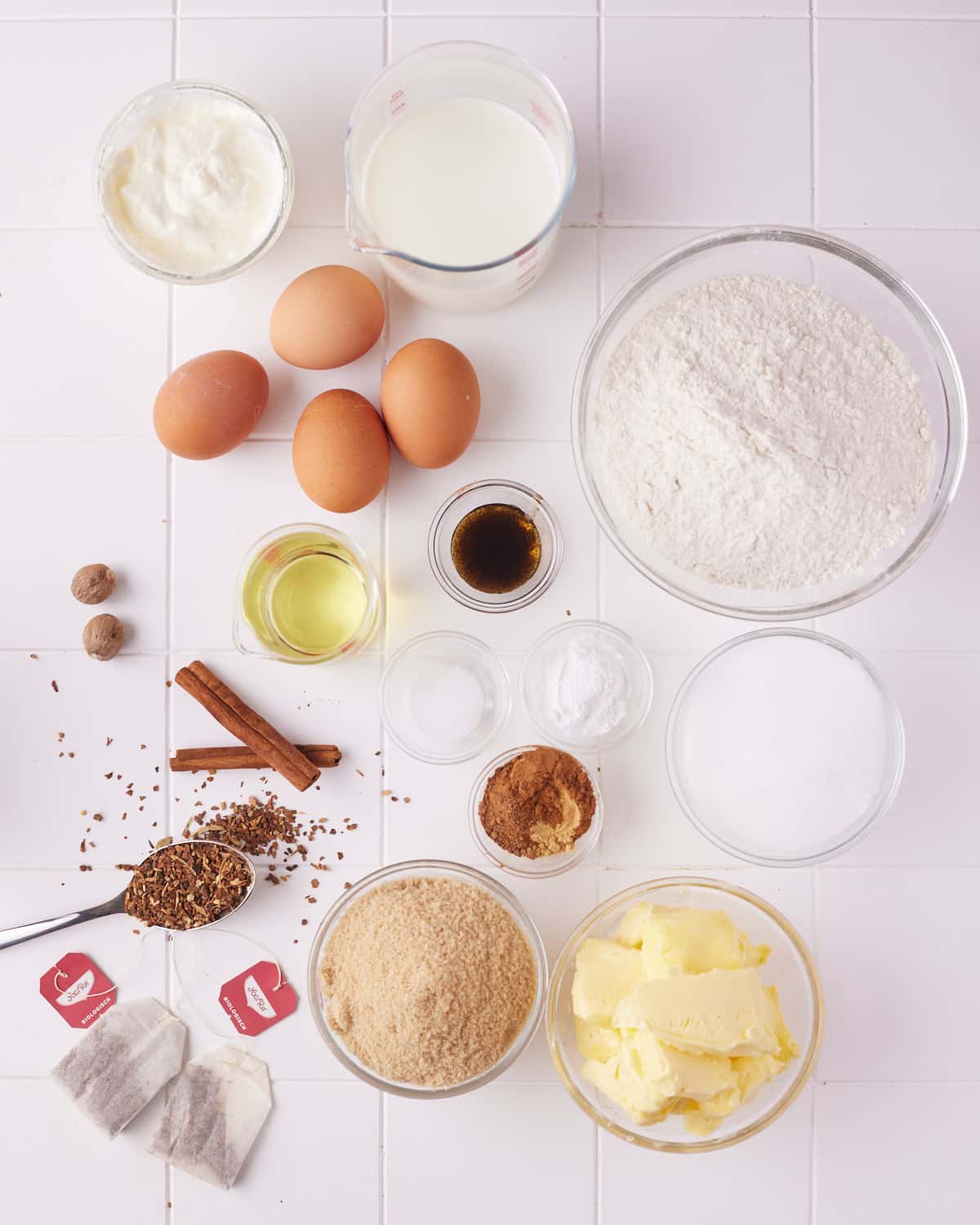 ingredients to make chai cake with brown butter cream cheese frosting.