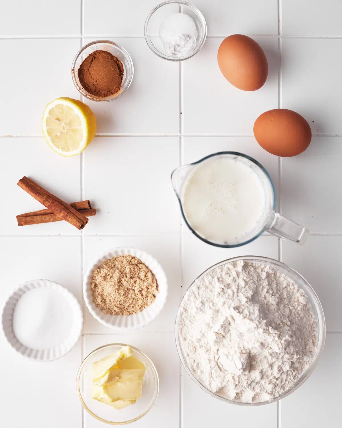 ingredients to make cinnamon waffles with cinnamon whipped cream.