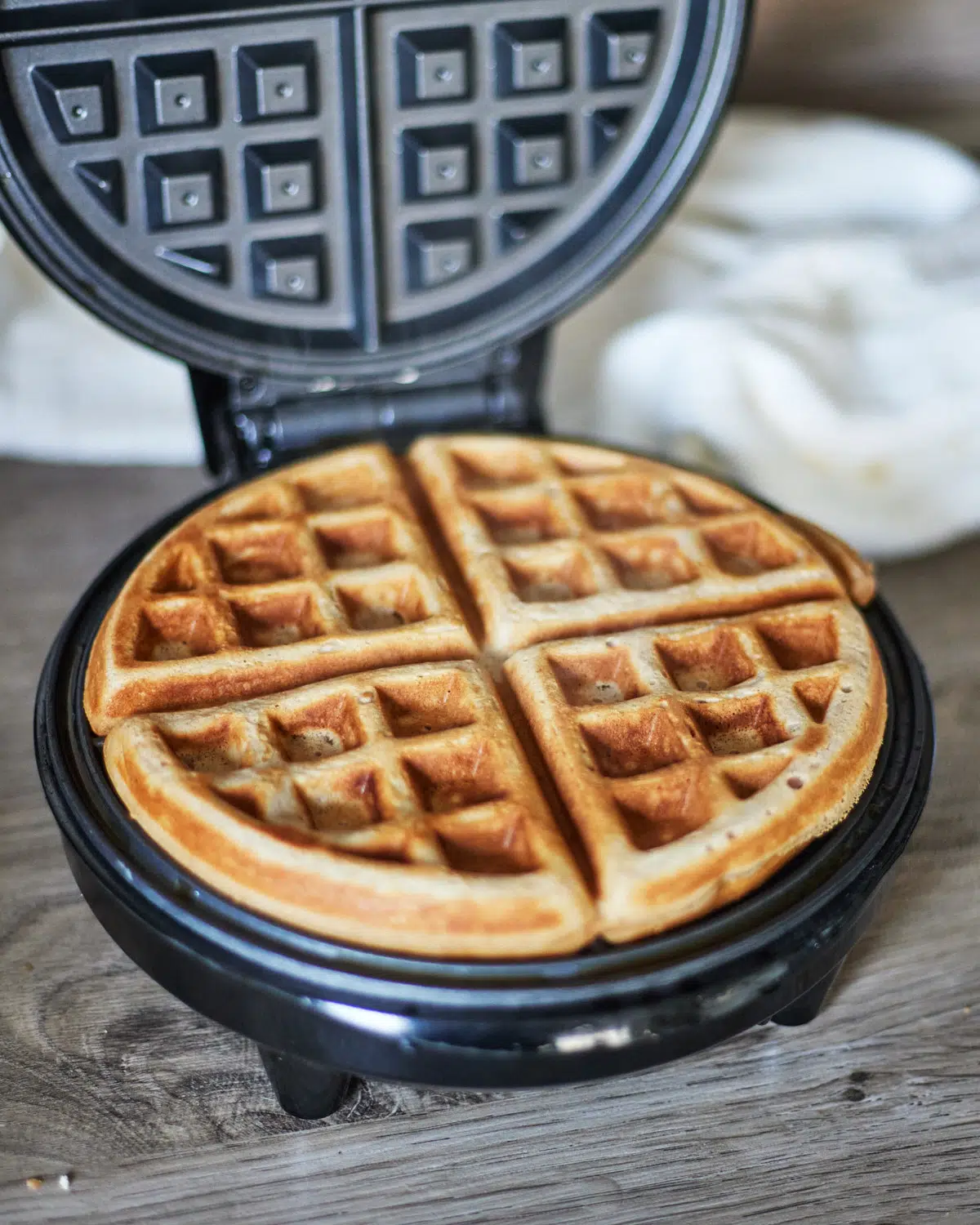 cinnamon waffle in waffle iron.