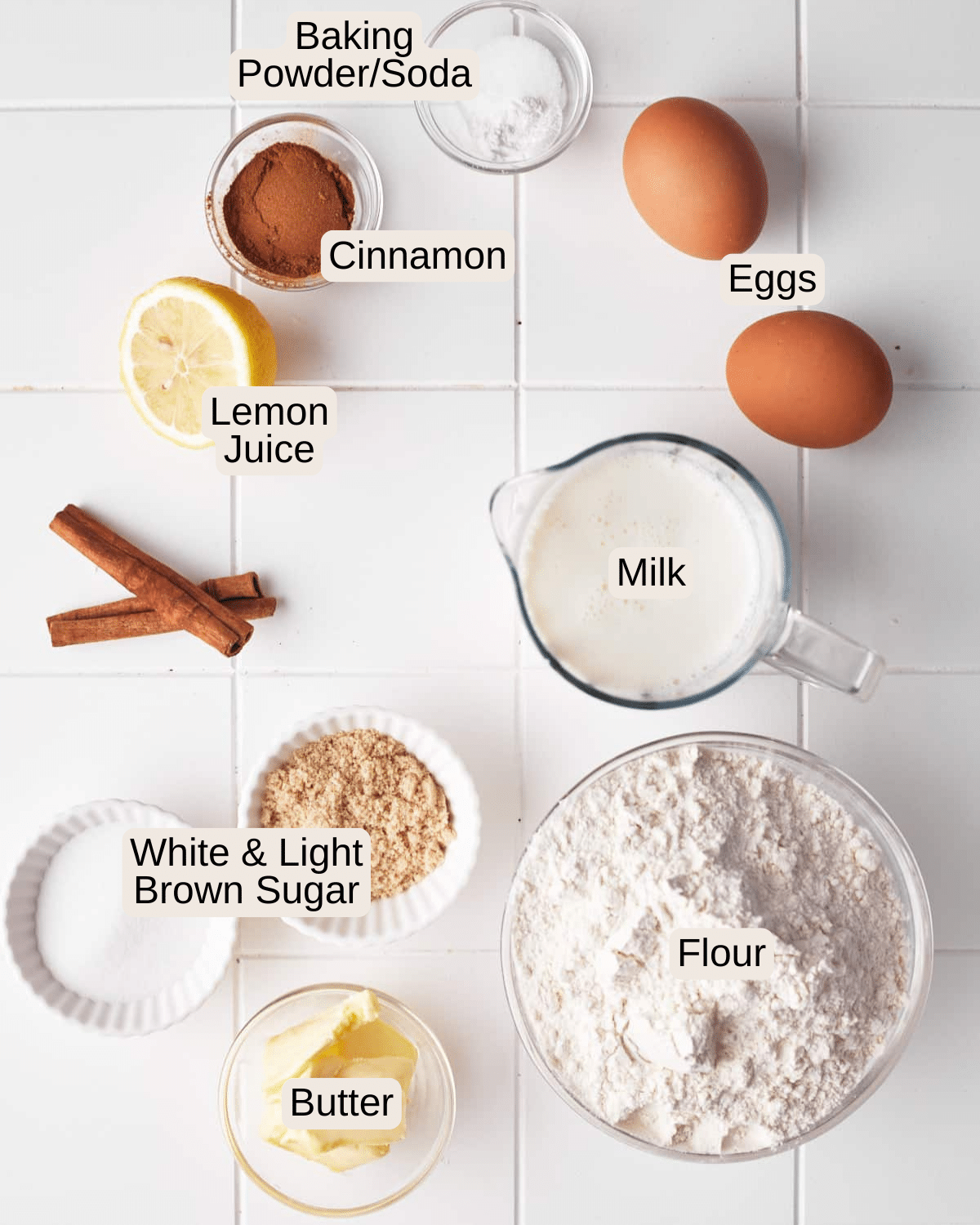 Ingredients for cinnamon waffles including cinnamon, leavening agents, eggs, lemon juice, milk, white sugar, light brown sugar, flour, and butter.
