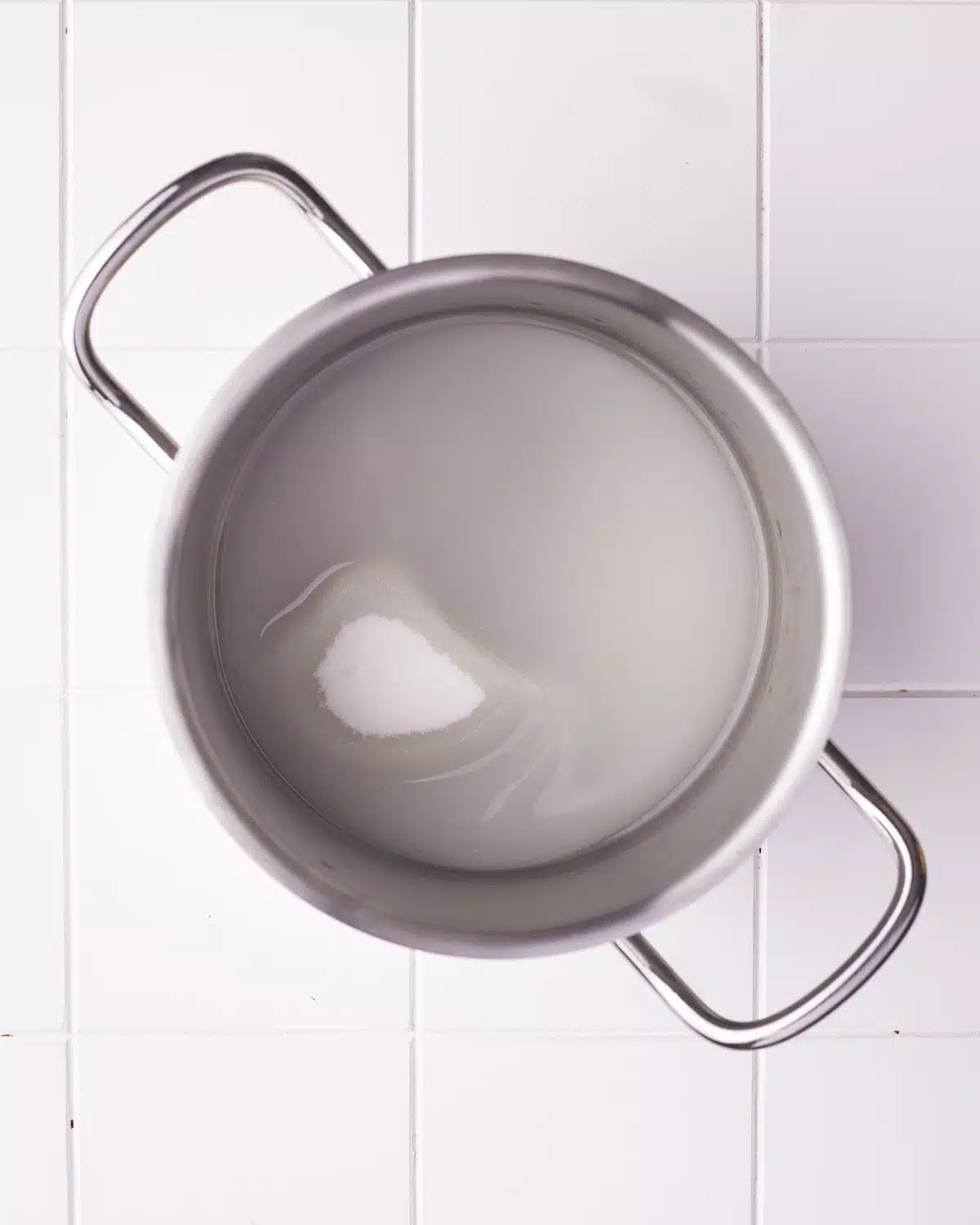 sugar and water in a saucepan to make sugar syrup.