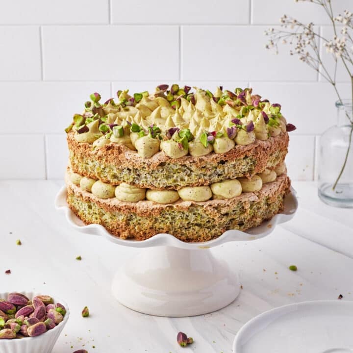 Pistachio Dacquoise cake filled with pistachio french buttercream.