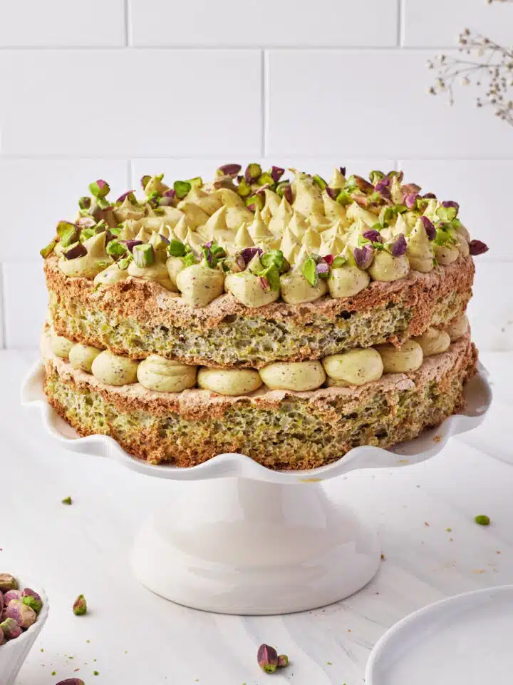 Pistachio Dacquoise cake filled with pistachio french buttercream.