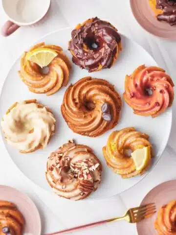 Mini bundt cakes on a plate - six different flavors from one base recipe.