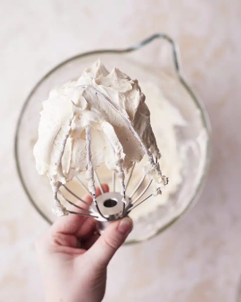 process shot of making mascarpone cream for tiramisu cookies.