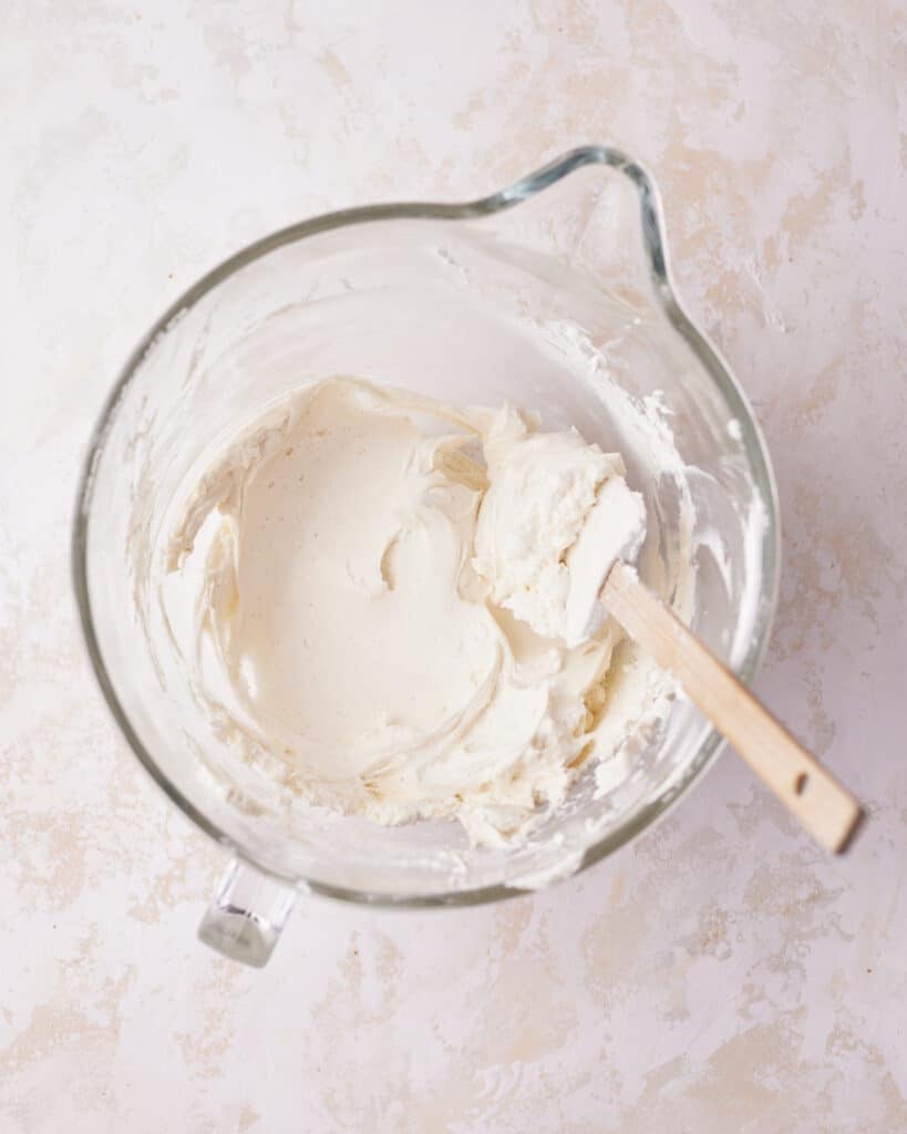 process shot of making mascarpone cream for tiramisu cookies.