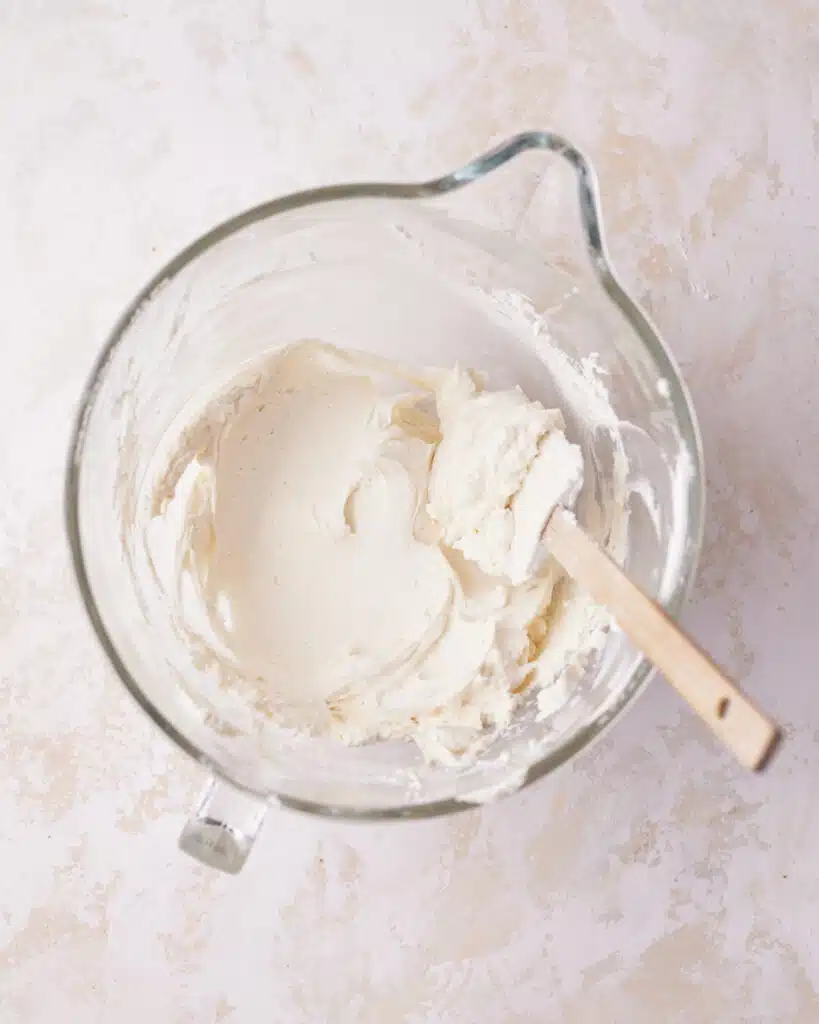 process shot of making mascarpone cream for tiramisu cookies.