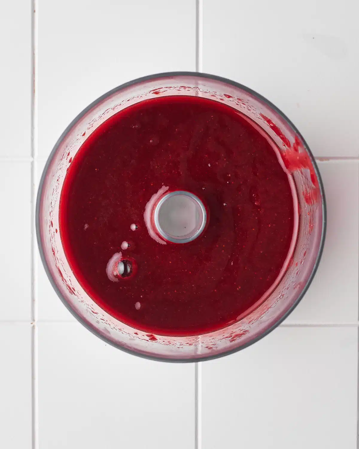 strawberry puree in a food processor after blending until smooth.