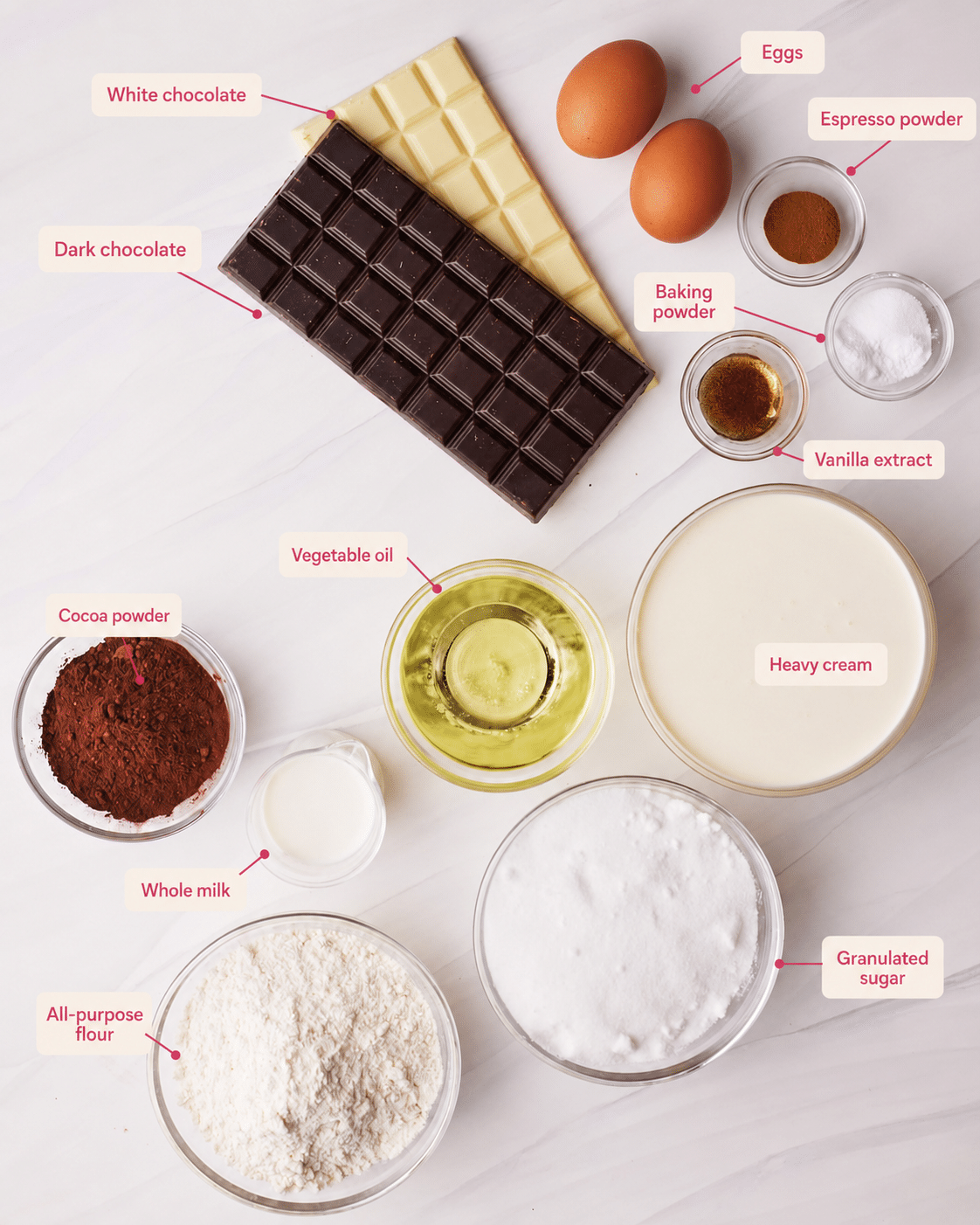 Ingredients to make tuxedo cake with white and dark chocolate mousse.