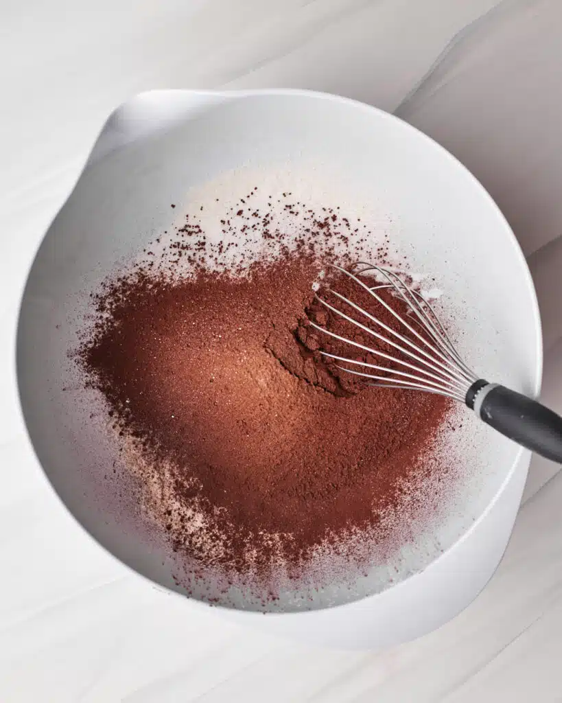 process shot of making tuxedo cake - all dry ingredients together in a bowl.