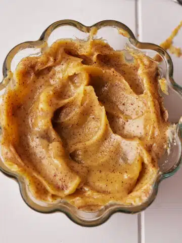 solidified brown butter in a small glass dish.