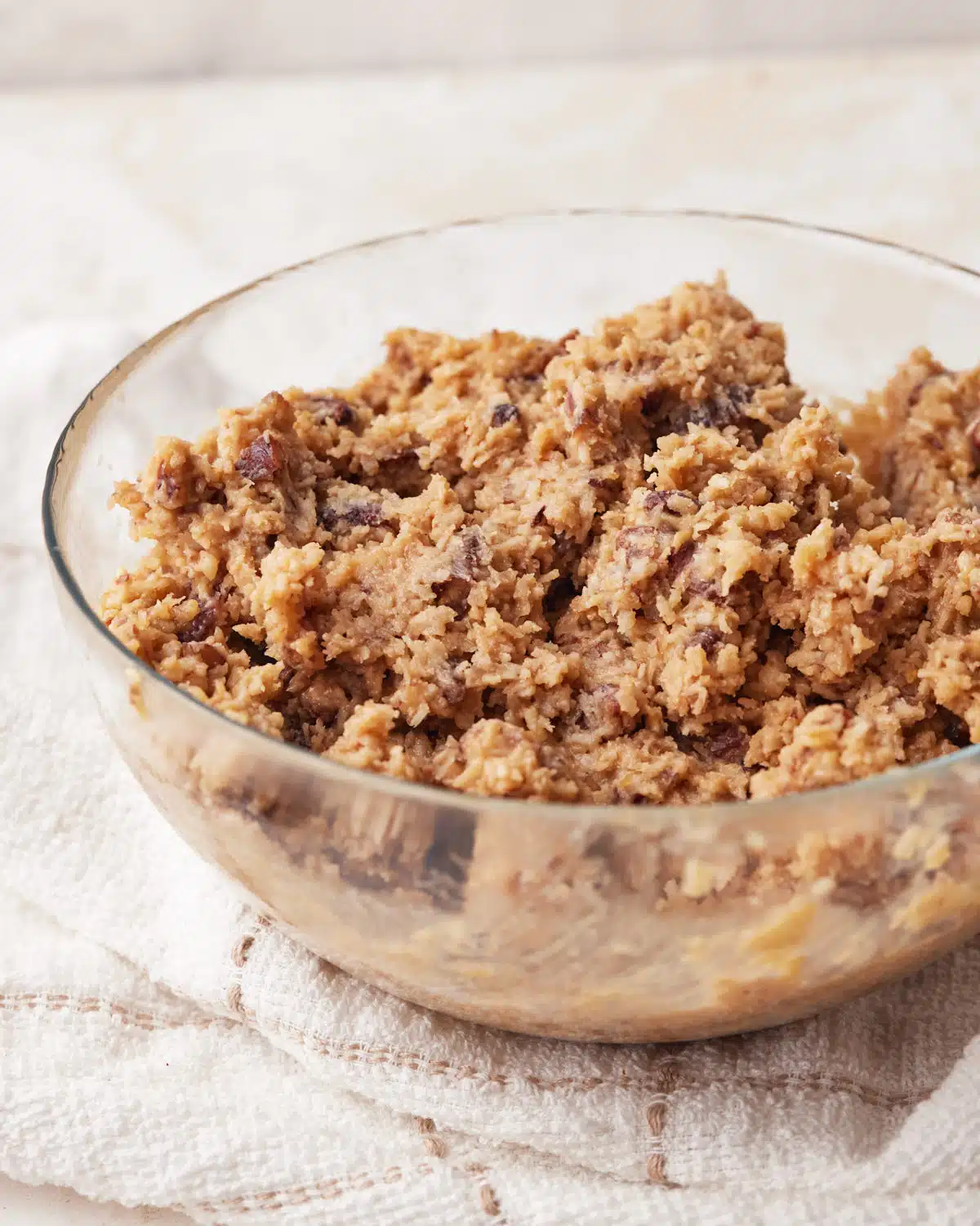 German chocolate frosting in a glass bowl. 