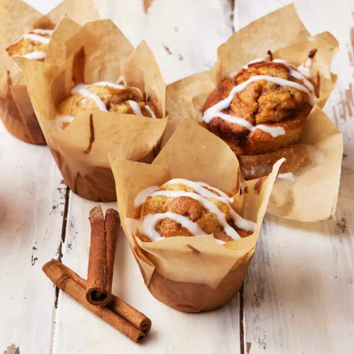Cinnamon roll muffins with cream cheese glaze.