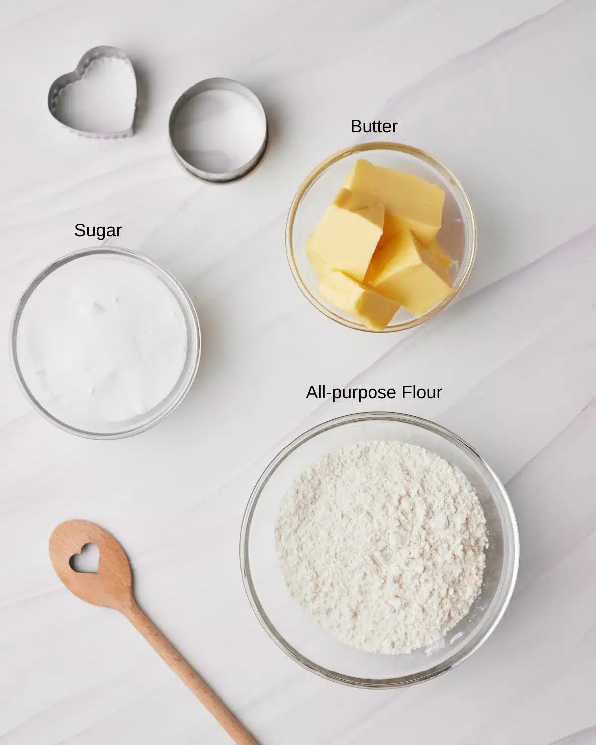 Ingredients to make 3 ingredient sugar cookies - sugar, butter and flour.