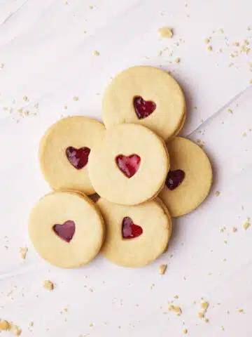 Homemade jammie dodgers lying in a pile.