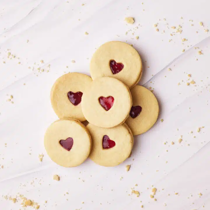 Homemade jammie dodgers lying in a pile.