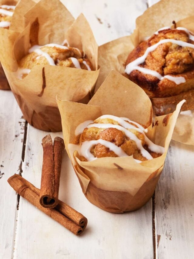 Cinnamon roll muffins with cream cheese glaze.