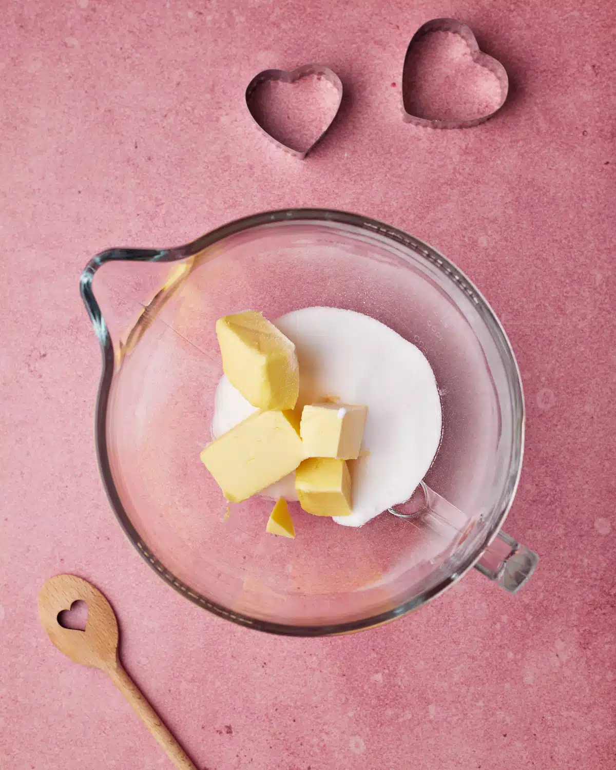 Creaming butter and sugar together to make heart cookies. 