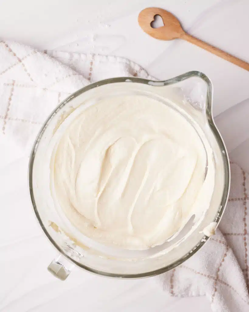 Process shot of making vanilla cupcakes - showing cupcake batter.